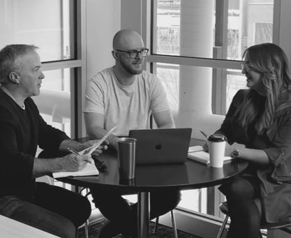 People sitting around a table in an office