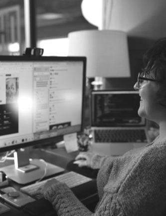 An over the shoulder photo of a person working on a website layout